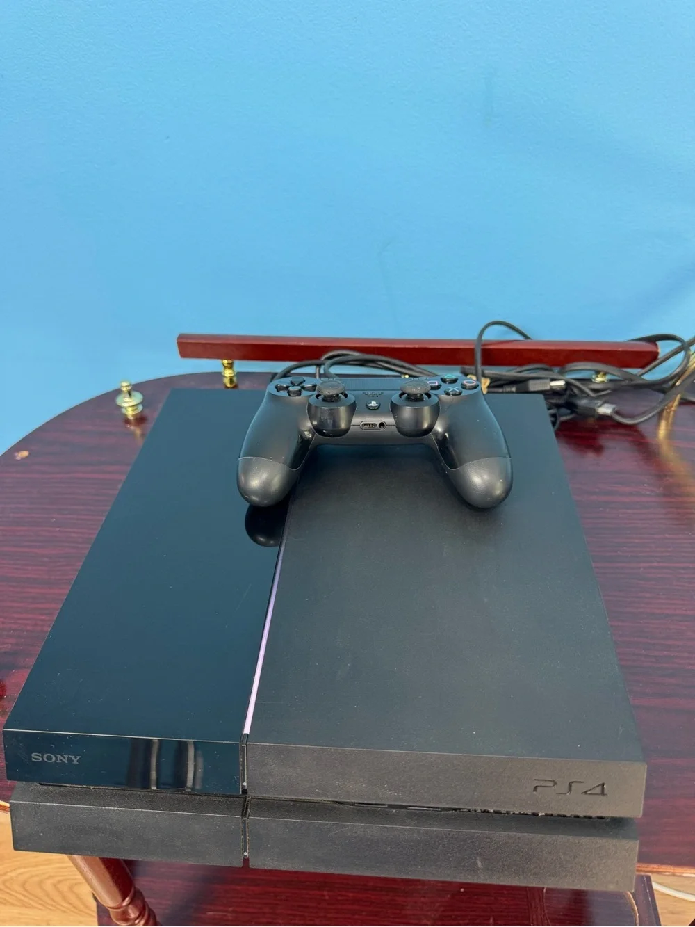 Sony PlayStation 4 Console with Black DualShock Controller